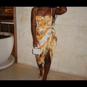 Pretty little things corset top and skirt set, worn once excellent condition.